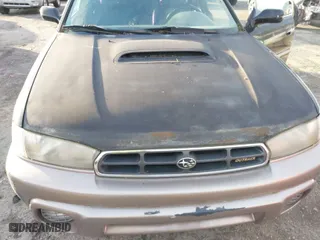 1999 Subaru Legacy Wagon Outback with VIN 4S3BG6856X7603852, listed as a IAAI auction lot 41299373 with 168,991 mi miles. Bid and sale history available at carsss.com. Image 6.