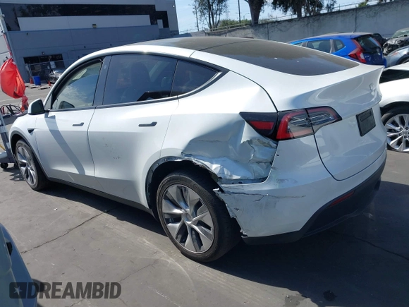 2021 Tesla Model Y Long Range with VIN 5YJYGDEE3MF081304, listed as a IAAI auction lot 41706240 with 90,510 mi miles and . Bid and sale history available at DreamBid. Image 3.