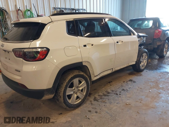 2022 Jeep Compass Latitude with VIN 3C4NJDBB9NT152152, listed as a IAAI auction lot 41377165 with 58,993 mi miles and . Bid and sale history available at DreamBid. Image 4.
