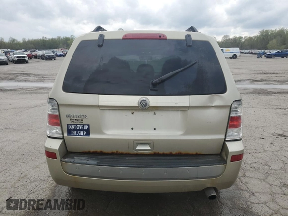 2010 Mercury Mariner z VIN 4M2CN9B76AKJ24013, wystawiony jako Copart lot #54509585 z przebiegiem 118 004 mil mil oraz Szkody całkowita. Historia ofert i sprzedaży dostępna na DreamBid. Obrazek 6.