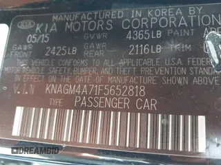 2015 Kia Optima LX with VIN KNAGM4A71F5652818, listed as a IAAI auction lot 41656933 with 251,967 mi miles. Bid and sale history available at carsss.com. Image 9.