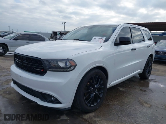 2015 Dodge Durango SXT with VIN 1C4RDHAG0FC793443, listed as a IAAI auction lot 41376184 with 113,123 mi miles and . Bid and sale history available at DreamBid. Image 2.