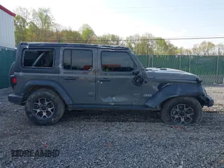 2019 Jeep Wrangler Unlimited Sport S with VIN 1C4HJXDG6KW578720, listed as a IAAI auction lot 42057153 with 65,719 mi miles and . Bid and sale history available at DreamBid. Image 13.