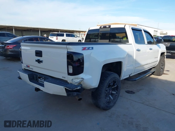 2016 Chevrolet Silverado 1500 LTZ with VIN 3GCUKSEJ0GG221628, listed as a IAAI auction lot 41276045 with 153,476 mi miles. Bid and sale history available at carsss.com. Image 4.