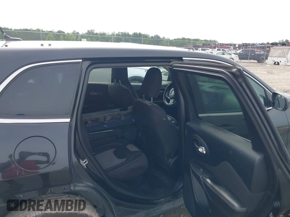 2014 Jeep Cherokee Latitude with VIN 1C4PJLCS4EW106479, listed as a IAAI auction lot 42283214 with 179,029 mi miles and . Bid and sale history available at DreamBid. Image 8.