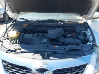 2012 Mazda CX-9 Sport z VIN JM3TB2BA6C0361981, wystawiony jako IAAI lot #42320797 z przebiegiem 152 239 mil mil oraz . Historia ofert i sprzedaży dostępna na DreamBid. Obrazek 10.