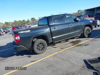 2021 Toyota Tundra SR5 with VIN 5TFDY5F13MX005925, listed as a IAAI auction lot 41352132 with 57,470 mi miles and . Bid and sale history available at DreamBid. Image 4.
