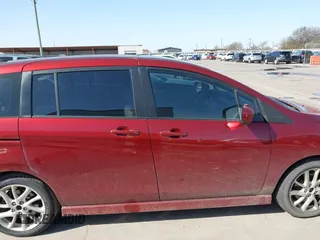 2012 Mazda Mazda5 Grand Touring with VIN JM1CW2DL1C0132281, listed as a IAAI auction lot 41698161 with 121,179 mi miles. Bid and sale history available at carsss.com. Image 13.