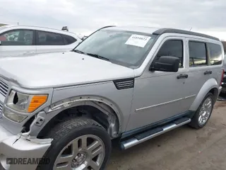 2011 Dodge Nitro Heat with VIN 1D4PU4GK6BW607590, listed as a IAAI auction lot 41810823 with 87,179 mi miles. Bid and sale history available at carsss.com. Image 14.