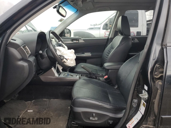 2012 Subaru Forester X Limited with VIN JF2SHAFC4CH417945, listed as a Copart auction lot 58810215 with 220,276 mi miles and Salvage title. Bid and sale history available at DreamBid. Image 7.