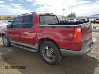 2003 Ford Explorer Sport Trac XLS z VIN 1FMZU67EX3UA71831, wystawiony jako Copart lot #57167025 z przebiegiem 145 290 mil mil oraz Szkoda całkowita • Salvage title. Historia ofert i sprzedaży dostępna na DreamBid. Obrazek 2.