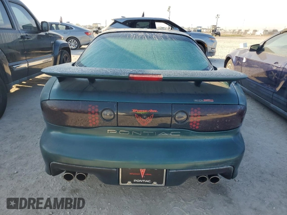 2000 Pontiac Firebird Formula z VIN 2G2FV22G2Y2160915, wystawiony jako Copart lot #76196454 z przebiegiem Nie podano mil oraz Czysty tytuł • Clean title. Historia ofert i sprzedaży dostępna na DreamBid. Obrazek 6.