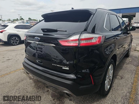 2020 Ford Edge Titanium z VIN 2FMPK3K91LBA60874, wystawiony jako IAAI lot #42470865 z przebiegiem 94 048 mil mil oraz . Historia ofert i sprzedaży dostępna na DreamBid. Obrazek 10.