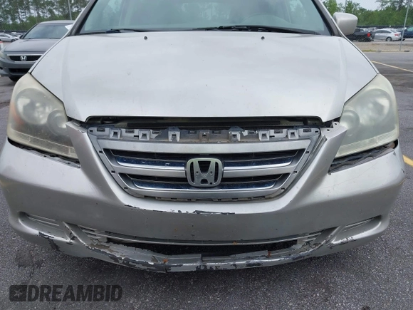 2007 Honda Odyssey EX-L z VIN 5FNRL38647B426620, wystawiony jako IAAI lot #42059093 z przebiegiem 258 622 mil mil oraz . Historia ofert i sprzedaży dostępna na DreamBid. Obrazek 6.