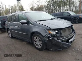 2014 Honda Odyssey EX-L with VIN 5FNRL5H63EB033684, listed as a IAAI auction lot 42025249 with 128,017 mi miles and . Bid and sale history available at carsss.com. Image 1.
