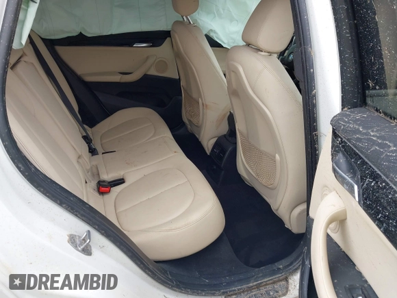 2018 BMW X1 xDrive28i with VIN WBXHT3C31J5K22765, listed as a IAAI auction lot 41800397 with 110,205 mi miles and . Bid and sale history available at DreamBid. Image 8.