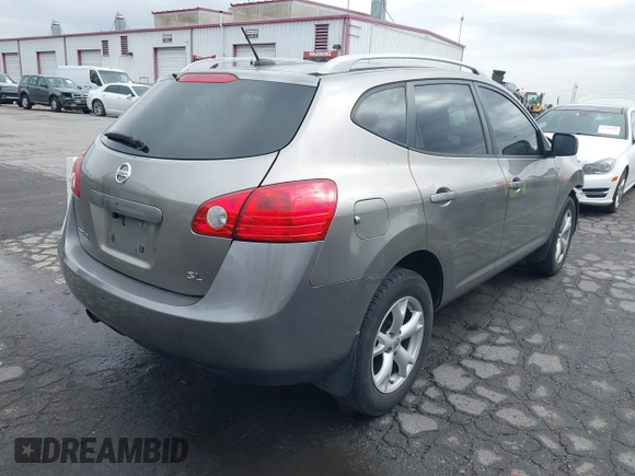 2009 Nissan Rogue SL with VIN JN8AS58T89W061346, listed as a IAAI auction lot 41772866 with 184,571 mi miles and . Bid and sale history available at DreamBid. Image 4.