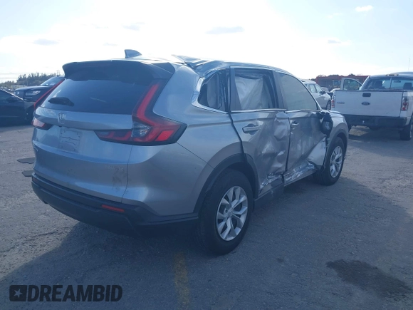 2024 Honda CR-V LX with VIN 2HKRS3H21RH308688, listed as a IAAI auction lot 41350785 with 19,835 mi miles and . Bid and sale history available at DreamBid. Image 4.