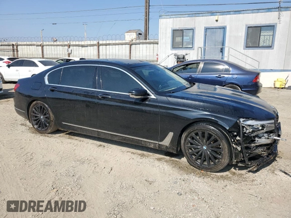 2016 BMW 7 Series 740i z VIN WBA7E2C58GG738940, wystawiony jako Copart lot #60503595 z przebiegiem 99 654 mil mil oraz Szkoda całkowita • Salvage title. Historia ofert i sprzedaży dostępna na DreamBid. Obrazek 4.