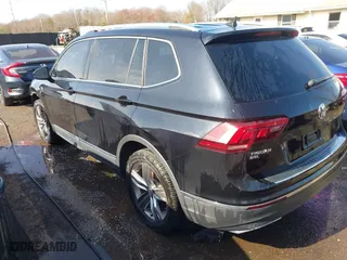 2020 Volkswagen Tiguan SE with VIN 3VV2B7AX5LM116837, listed as a IAAI auction lot 41791864 with 76,623 mi miles. Bid and sale history available at carsss.com. Image 3.