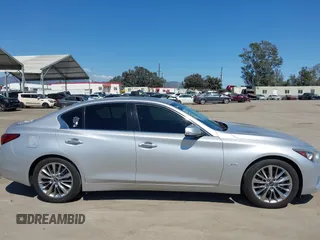 2018 Infiniti Q50 Luxe z VIN JN1EV7AP5JM592164, wystawiony jako IAAI lot #42237910 z przebiegiem 39 553 mil mil oraz . Historia ofert i sprzedaży dostępna na DreamBid. Obrazek 13.