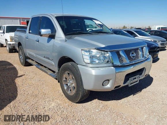 2011 Nissan Titan SV with VIN 1N6BA0ED7BN318878, listed as a IAAI auction lot 41518618 with 169,890 mi miles and . Bid and sale history available at DreamBid. Image 1.