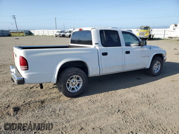 2001 Dodge Dakota Sport z VIN 1B7GL2AN81S120632, wystawiony jako Copart lot #50730415 z przebiegiem 191 302 mil mil oraz Czysty tytuł • Clean title. Historia ofert i sprzedaży dostępna na DreamBid. Obrazek 3.