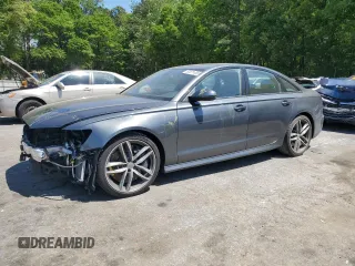 2017 Audi S6 Premium Plus z VIN WAUFFAFCXHN012281, wystawiony jako Copart lot #53571455 z przebiegiem 67 439 mil mil oraz Szkoda całkowita • Salvage title. Historia ofert i sprzedaży dostępna na DreamBid. Obrazek 1.
