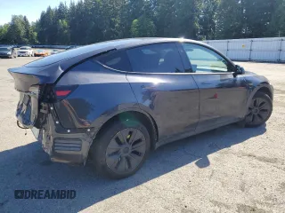 2024 Tesla Model Y Long Range with VIN 7SAYGDEE9RF120729, listed as a Copart auction lot 57360265 with 21,589 mi miles and Salvage title. Bid and sale history available at DreamBid. Image 3.
