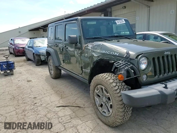 2015 Jeep Wrangler Unlimited Rubicon with VIN 1C4BJWFGXFL752602, listed as a Copart auction lot 54102395 with 26,466 mi miles and Salvage title. Bid and sale history available at DreamBid. Image 14.
