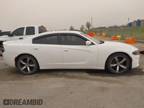 2017 Dodge Charger SE with VIN 2C3CDXBG1HH581654, listed as a IAAI auction lot 41836747 with 124,037 mi miles and . Bid and sale history available at carsss.com. Image 13.