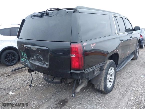 2016 Chevrolet Suburban LT with VIN 1GNSKHKCXGR478707, listed as a IAAI auction lot 41183747 with 157,893 mi miles. Bid and sale history available at carsss.com. Image 4.