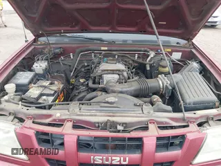 2004 Isuzu Rodeo S z VIN 4S2CK58W644317345, wystawiony jako IAAI lot #41940961 z przebiegiem Nie podano mil oraz . Historia ofert i sprzedaży dostępna na DreamBid. Obrazek 10.