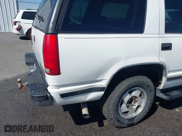 1999 Chevrolet Tahoe Z71 with VIN 1GNEK13R3XJ412067, listed as a IAAI auction lot 41789660 with 196,916 mi miles and . Bid and sale history available at DreamBid. Image 6.