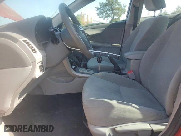 2010 Toyota Corolla with VIN 2T1BU4EE3AC413885, listed as a Copart auction lot 53984225 with 172,982 mi miles and Salvage Title. Bid and sale history available at DreamBid. Image 7.