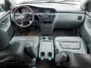 2003 Honda Odyssey EX-L with VIN 5FNRL18913B134321, listed as a Copart auction lot 44525465 with 254,666 mi miles and Salvage Title. Bid and sale history available at DreamBid. Image 8.