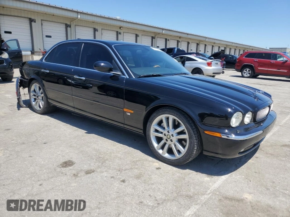 2004 Jaguar XJ с VIN SAJEA73B34TG10749, выставлен на аукционе Copart как лот 56574025 с пробегом 72 240 миль миль и Списание • Salvage title. История ставок и продаж доступна на DreamBid. Изображение 4.