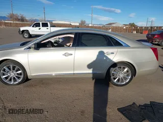 2014 Cadillac XTS Luxury z VIN 2G61N5S3XE9298471, wystawiony jako IAAI lot #41069292 z przebiegiem 92 112 mil mil oraz . Historia ofert i sprzedaży dostępna na DreamBid. Obrazek 13.