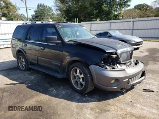 2004 Lincoln Navigator Luxury with VIN 5LMFU27R04LJ12874, listed as a Copart auction lot 76061434 with 243,480 mi miles and Salvage Title. Bid and sale history available at carsss.com. Image 4.