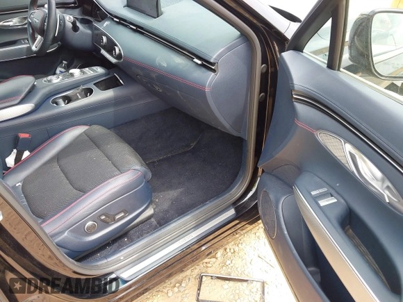 2023 Genesis GV70 2.5T with VIN KMUMADTB5PU080446, listed as a IAAI auction lot 42039639 with 46,273 mi miles and . Bid and sale history available at DreamBid. Image 5.