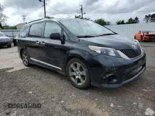 2014 Toyota Sienna SE with VIN 5TDXK3DC7ES425945, listed as a Copart auction lot 63067955 with 173,815 mi miles and Salvage title. Bid and sale history available at DreamBid. Image 4.
