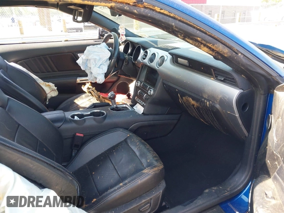 2022 Ford Mustang EcoBoost z VIN 1FATP8UH4N5102828, wystawiony jako IAAI lot #42073571 z przebiegiem 69 931 mil mil oraz . Historia ofert i sprzedaży dostępna na DreamBid. Obrazek 5.
