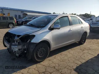 2010 Toyota Yaris z VIN JTDBT4K38A1391229, wystawiony jako Copart lot #61604075 z przebiegiem 183 301 mil mil oraz Szkoda całkowita • Salvage title. Historia ofert i sprzedaży dostępna na DreamBid. Obrazek 1.
