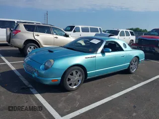 2002 Ford Thunderbird Hardtop Premium z VIN 1FAHP60AX2Y118061, wystawiony jako IAAI lot #42332263 z przebiegiem 162 591 mil mil oraz . Historia ofert i sprzedaży dostępna na DreamBid. Obrazek 2.