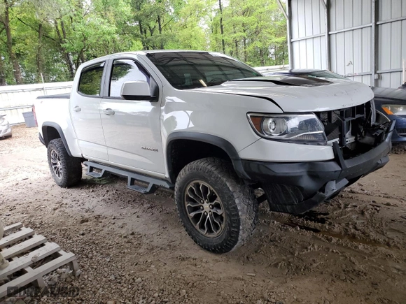 2019 Chevrolet Colorado 4WD ZR2 with VIN 1GCGTEEN5K1256848, listed as a Copart auction lot 51668185 with 99,913 mi miles and Non Repairable. Bid and sale history available at carsss.com. Image 4.