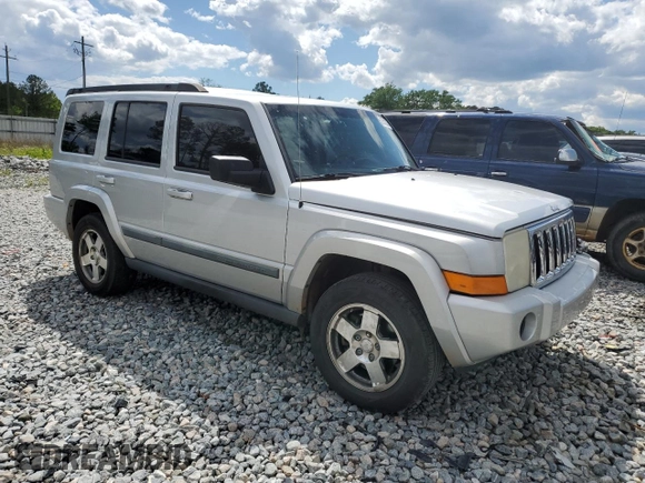 2009 Jeep Commander Sport with VIN 1J8HH48K89C540189, listed as a Copart auction lot 52552235 with 258,377 mi miles and Salvage title. Bid and sale history available at DreamBid. Image 4.