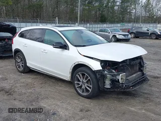 2015 Volvo V60 Cross Country T5 with VIN YV4612HK7F1001607, listed as a IAAI auction lot 41216339 with 138,069 mi miles. Bid and sale history available at carsss.com. Image 1.