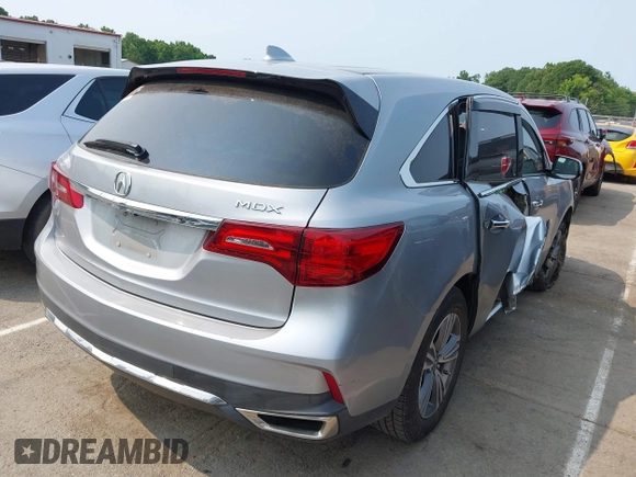 2020 Acura MDX with VIN 5J8YD3H39LL016466, listed as a IAAI auction lot 42376611 with 74,873 mi miles and . Bid and sale history available at DreamBid. Image 4.