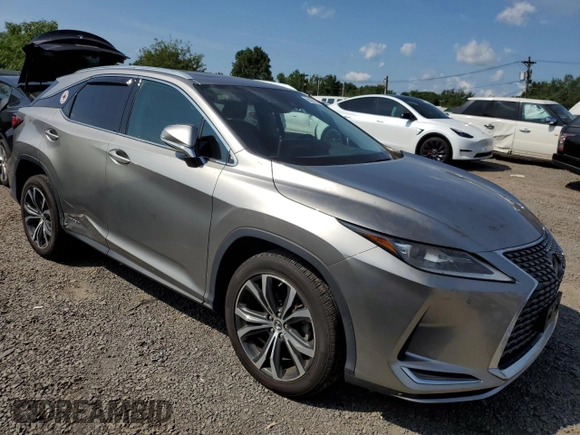 2021 Lexus RX 450h with VIN 2T2HGMDA6MC066035, listed as a Copart auction lot 65873235 with 51,949 mi miles and Salvage title. Bid and sale history available at DreamBid. Image 4.