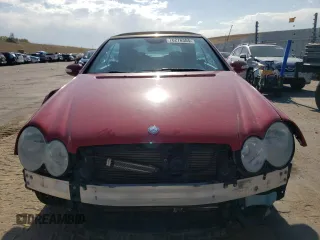 2005 Mercedes-Benz CLK 500 with VIN WDBTK75J55F163229, listed as a Copart auction lot 76276354 with 76,829 mi miles and Salvage Title. Bid and sale history available at DreamBid. Image 5.